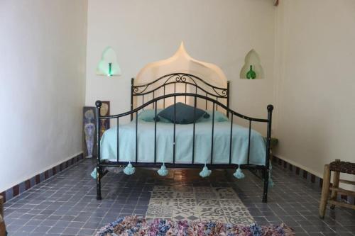 En eller flere senge i et værelse på Chez sarah