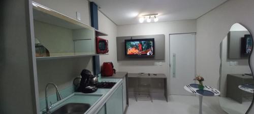 TV a/nebo společenská místnost v ubytování Loft Portal Beach 02