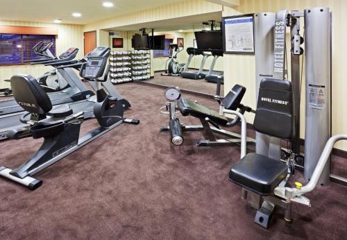 a gym with cardio equipment in a hotel room at Holiday Inn Express Portland South - Lake Oswego by IHG in Lake Oswego