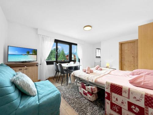 Ένα ή περισσότερα κρεβάτια σε δωμάτιο στο Cosy Nest -Nendaz - 4 Valleys - Swiss Alps