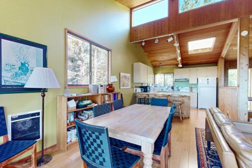 a dining room with a wooden table and chairs at Sea View in Sea Ranch
