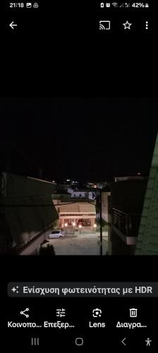 a picture of a night view of a building at FLAT with Private Rooms in Agrinion