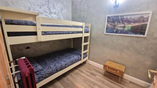 Postel nebo postele na pokoji v ubytování Rifugio Elite Terminillo