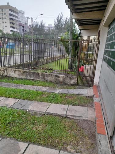 Billede fra billedgalleriet på Verão para 10 pessoas em frente à Praça Boianovsky i Capão da Canoa