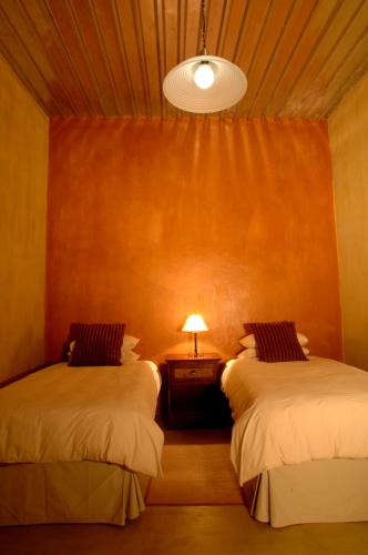 Кровать или кровати в номере Naries Namakwa Retreat
