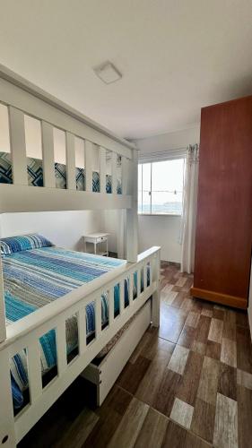 Ένα ή περισσότερα κρεβάτια σε δωμάτιο στο Recanto Da Val