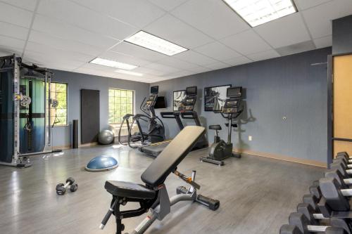 a room with a gym with exercise equipment in it at Staybridge Suites Rogers - Bentonville by IHG in Rogers