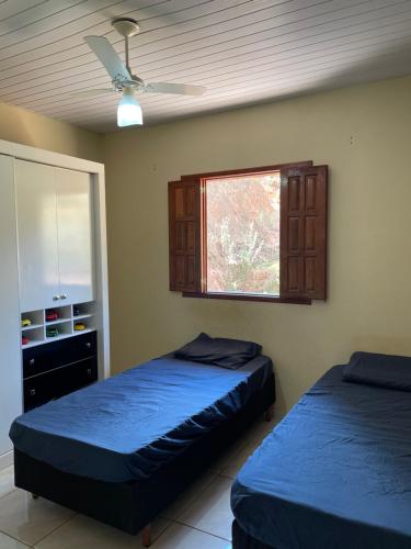 Ένα ή περισσότερα κρεβάτια σε δωμάτιο στο Casa de campo