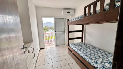 Ένα ή περισσότερα κρεβάτια σε δωμάτιο στο Recanto Da Val