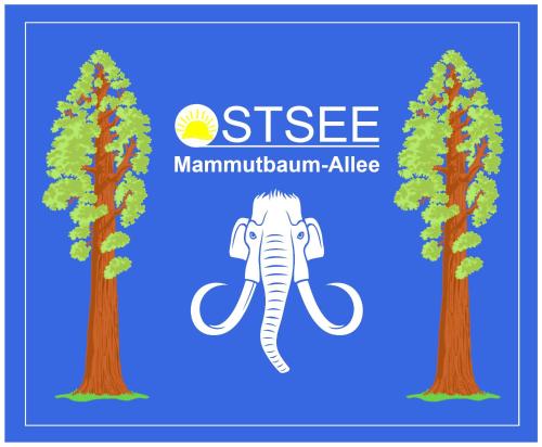 an elephant standing between two trees with the words stress mammothawn allele at Ostsee Hotel-Pension An der Lindenallee in Bad Doberan