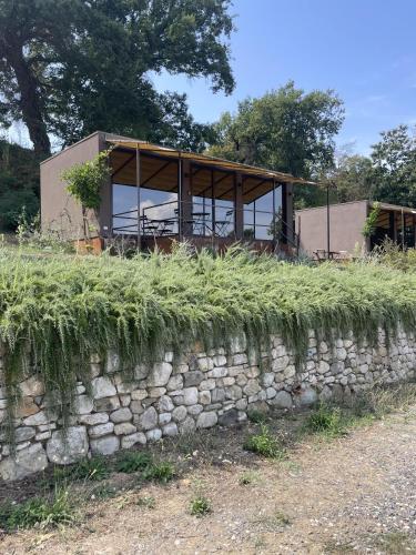 a house on top of a stone wall at Agriturismo Affaccio su Orvieto in Orvieto