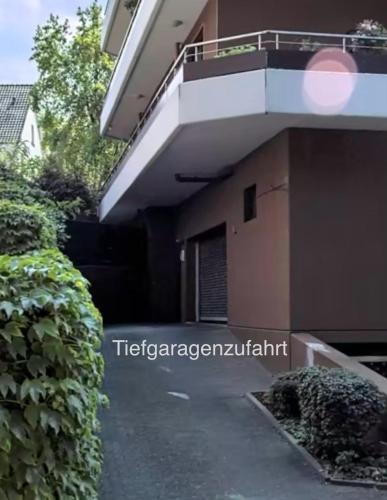 a building with a balcony on the side of it at Appartementresidenz am Kurpark - Ferienwohnungen mit Pool & Sauna & Garage in Bad Salzuflen