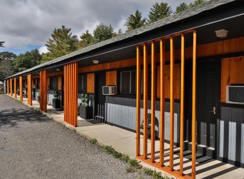 a row of buildings with orange doors on them at Matterhorns Hunter Lodge in Hunter