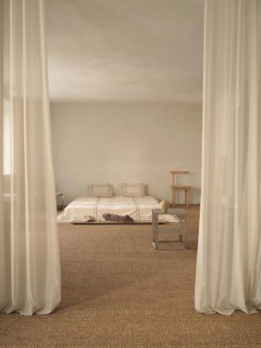 Ένα ή περισσότερα κρεβάτια σε δωμάτιο στο Noura Residency - City Apartment I