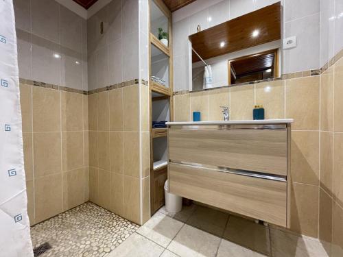 a bathroom with a sink and a toilet in it at Loustaou in Osserain-Rivareyte