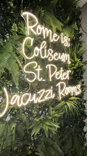 a sign that says rome is a garden st peter extra rooms at Jacuzzi Rooms Vatican Museum in Rome