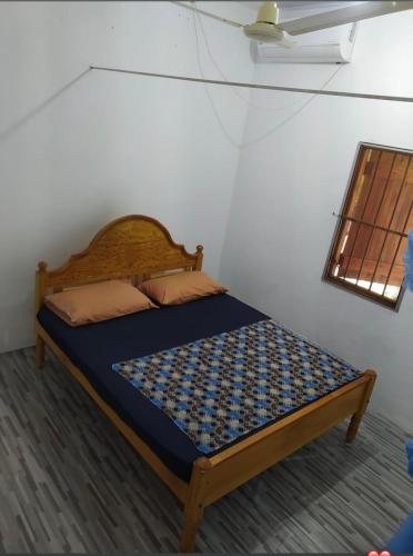 Postel nebo postele na pokoji v ubytování Joes Resthouse