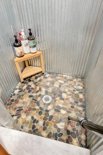 a corner of a room with a tiled floor at Sleeps 5-6 Near RRG-Hot Tub-Nice Sunrise-Quiet in Beattyville