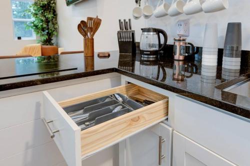 a kitchen with a drawer in the counter top at Sleeps 5-6 Near RRG-Hot Tub-Nice Sunrise-Quiet in Beattyville