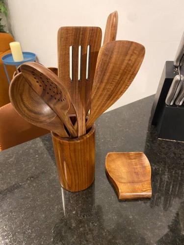 a cup filled with wooden utensils on a table at Sleeps 5-6 Near RRG-Hot Tub-Nice Sunrise-Quiet in Beattyville