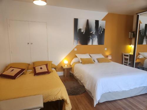 Postel nebo postele na pokoji v ubytování BnB Confort