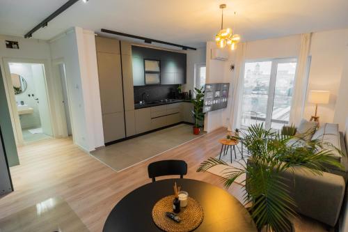 Μια τηλεόραση ή/και κέντρο ψυχαγωγίας στο Vulcan Residences - Premium Apartments