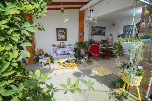 a living room filled with lots of furniture at Apartman Žurić in Vinkovci