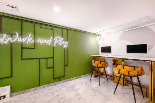 Телевизор и/или развлекательный центр в Lexia Hotels