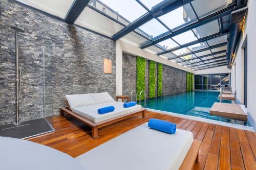 Postel nebo postele na pokoji v ubytování Lexia Hotels