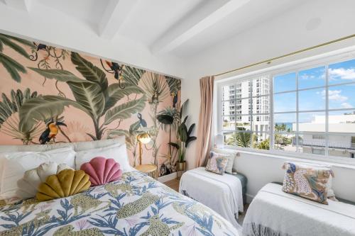Ένα ή περισσότερα κρεβάτια σε δωμάτιο στο Ocean Spray Hotel