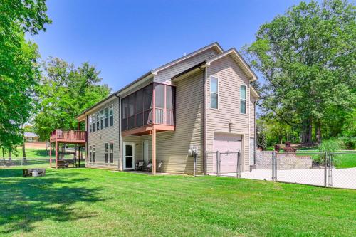 a house with a fence and a yard at Chattanooga House with Grill 12 Mi to Downtown! in Chattanooga