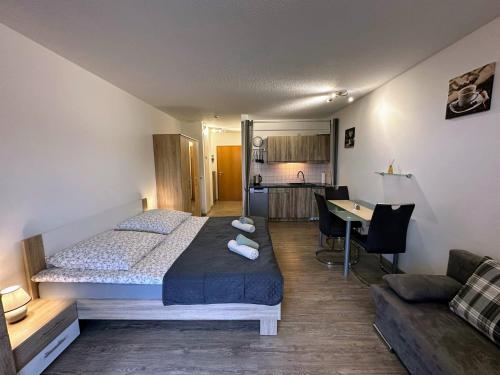 Ένα ή περισσότερα κρεβάτια σε δωμάτιο στο Apartament Oase der Ruhe