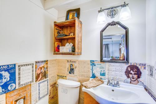 a bathroom with a sink and a toilet at Lake Holbrook Waterfront Vacation Rental with Dock! in Mineola