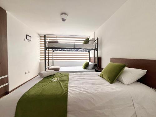 Postel nebo postele na pokoji v ubytování Hotel RYA Center
