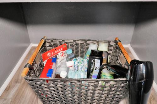 a basket filled with items in a room at Spacious 3 Bedroom, 4Bed Cozy Home in Lansing