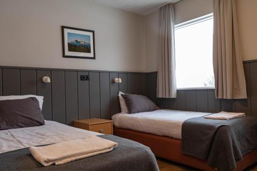 Postel nebo postele na pokoji v ubytování Hotel Skaftafell