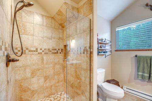 a bathroom with a shower and a toilet at Luxe Florissant Home with Pikes Peak Views! in Florissant