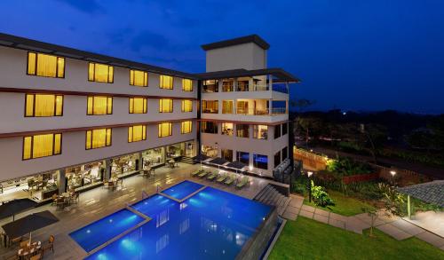 an aerial view of a hotel with a swimming pool at The Fern Kadamba Hotel And Spa in Old Goa