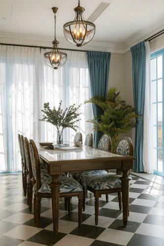 a dining room with a table and chairs at Villa Đà Lạt Khởi Nghĩa Bắc Sơn Gần Hồ Xuân Hương Gần Chợ Đêm - KNBS Lana in Xuan An