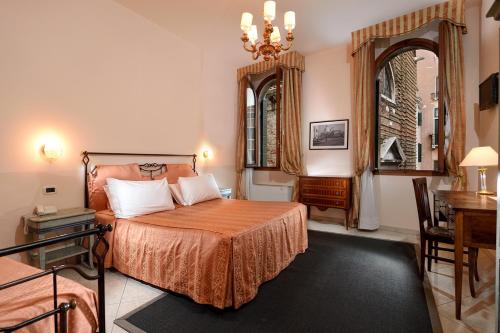 Katil atau katil-katil dalam bilik di La Locandiera