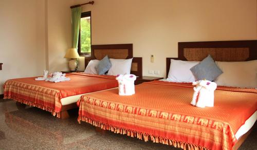 Cama o camas de una habitación en Coral Resort