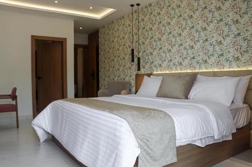 Cama o camas de una habitación en Nöa Hotel