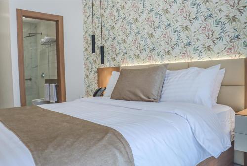 Cama o camas de una habitación en Nöa Hotel