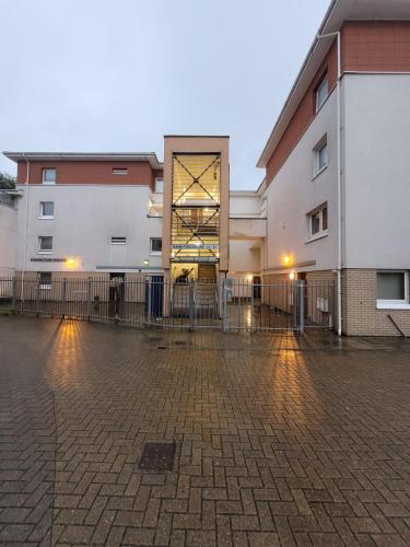 a group of buildings in a parking lot at egHoliday in London