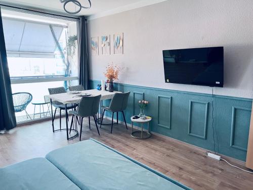 Μια τηλεόραση ή/και κέντρο ψυχαγωγίας στο Dresden City 2 Room - Design Apartment