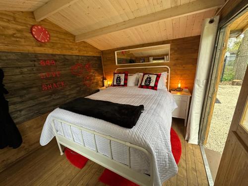 a bedroom with a bed in a tiny house at Stay549 in Winnipeg