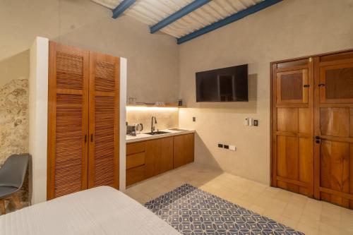 Kuchyň nebo kuchyňský kout v ubytování Casa Tunkul