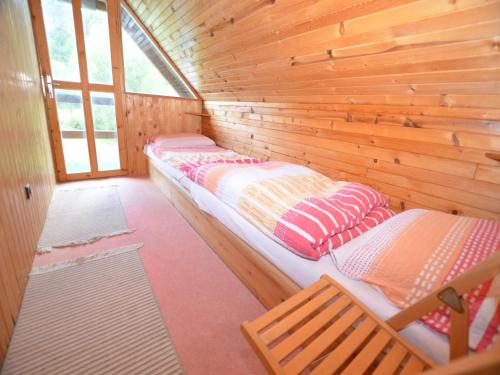 Postel nebo postele na pokoji v ubytování Chalet in Bechyne with Private Pool