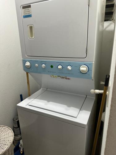 a refrigerator with a machine on top of it at Villa Verde 2 Casa 14 in Tamarindo