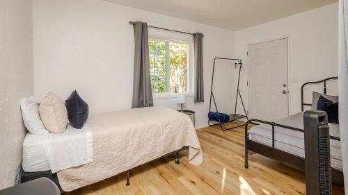 Cama o camas de una habitación en Copenhagen Cottage